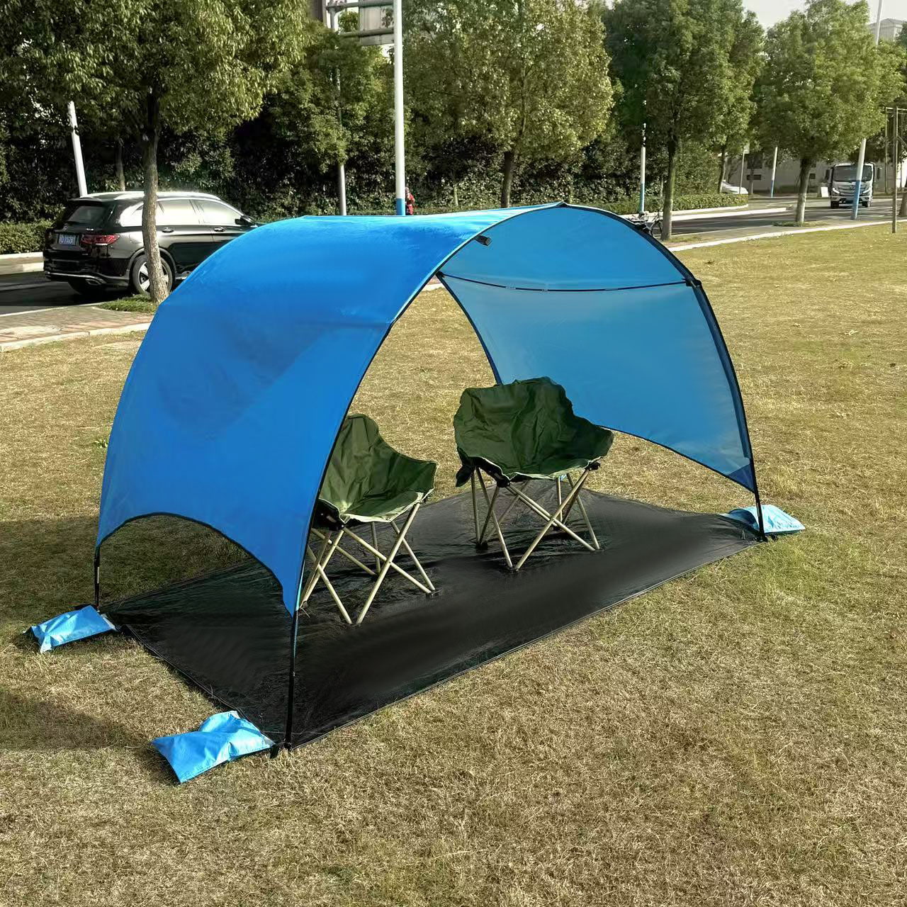 Outdoor strandcampingtent met geïntegreerde grondmat